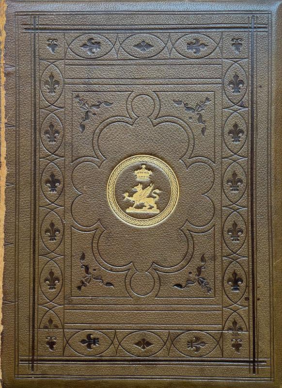 Brown book binding with dark brown fleur de lis and gold coat of arms with griffin.
